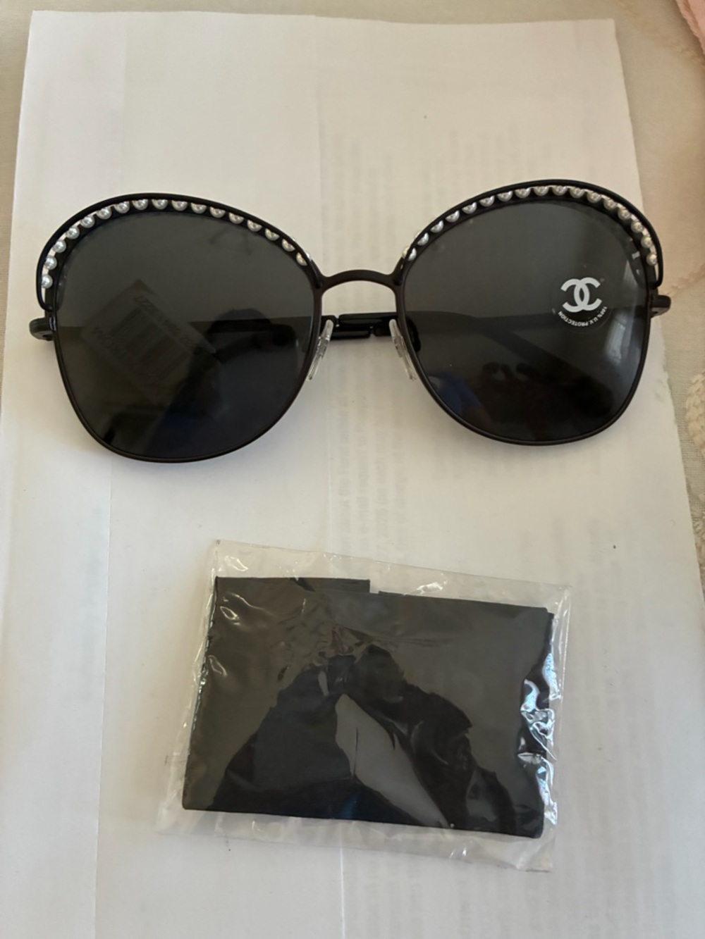 CHANEL Black Round Sunglasses with Crystal Accents